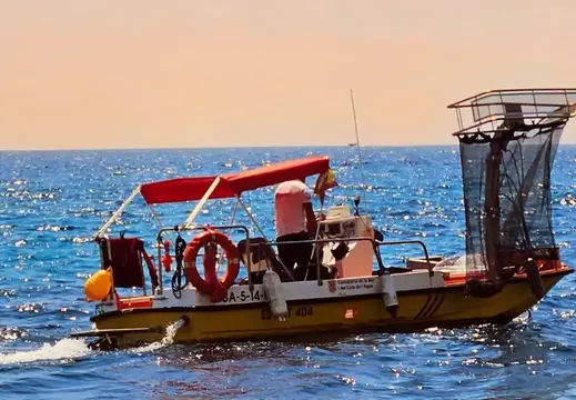 Sea-Cleaning Boat off Sant Agustí